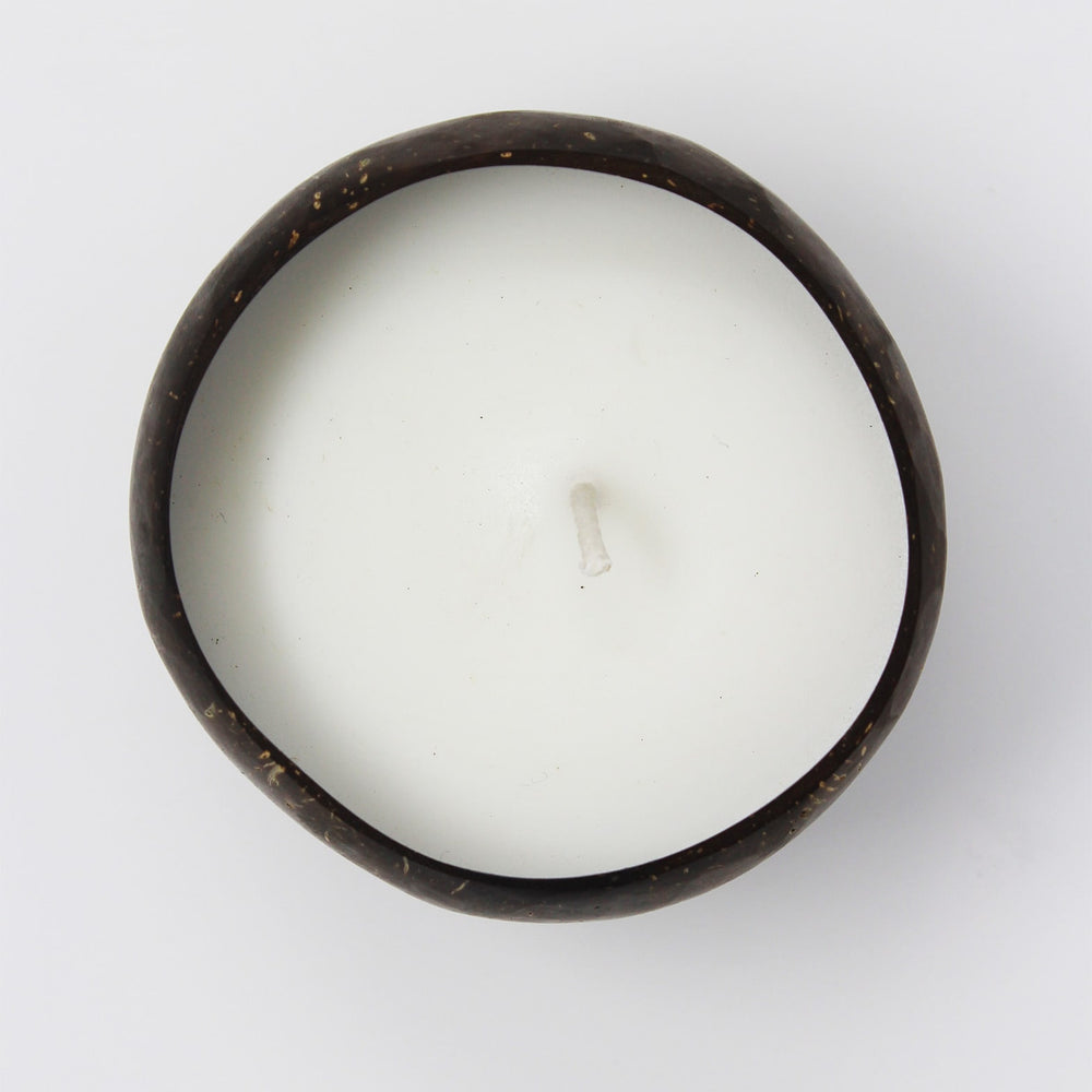 
                  
                    Round-Shaped Scented Soy Candle In Coconut Shell
                  
                